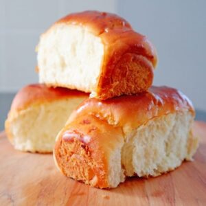 Freshly baked Japanese sweet milk stacked on cutting board